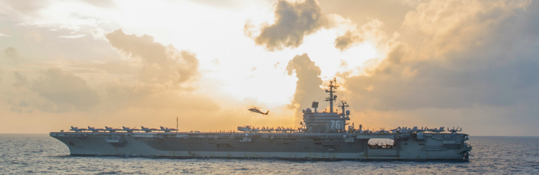  An MH-60R Sea Hawk helicopter prepares to land on the flight deck of the Nimitz-class aircraft carrier USS Ronald Reagan (CVN 76) during routine flight operations.