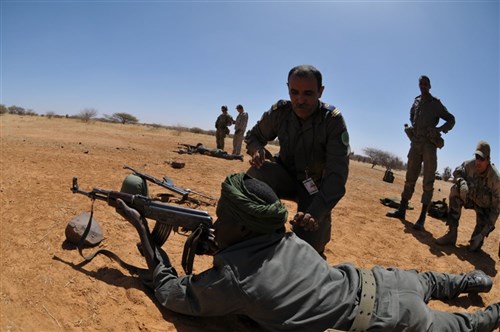 A Mauritanian soldier takes aim during basic rifle marksmanship training during Flintlock 2013. Flintlock is an annual military exercise conducted throughout the Sub-Saharan region of Africa, concentrating on ground, air operations, land navigation, human rights training and collaboration between militaries. Approximately 1,000 personnel are involved in Flintlock 2013, including participants from throughout north and west Africa, Europe and North America. (U.S. Army photo by Staff Sgt. Brendan Stephens)