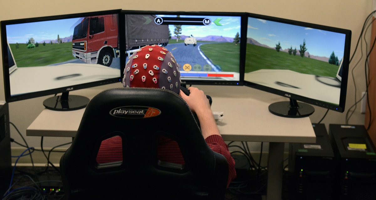 A car simulator Army Research Laboratory, Aberdeen Proving Ground, Md., July 28, 2016, shows EEG sensors and caps used to monitor test subjects' brain wave patterns while driving.  Photo Credit: David Vergun 