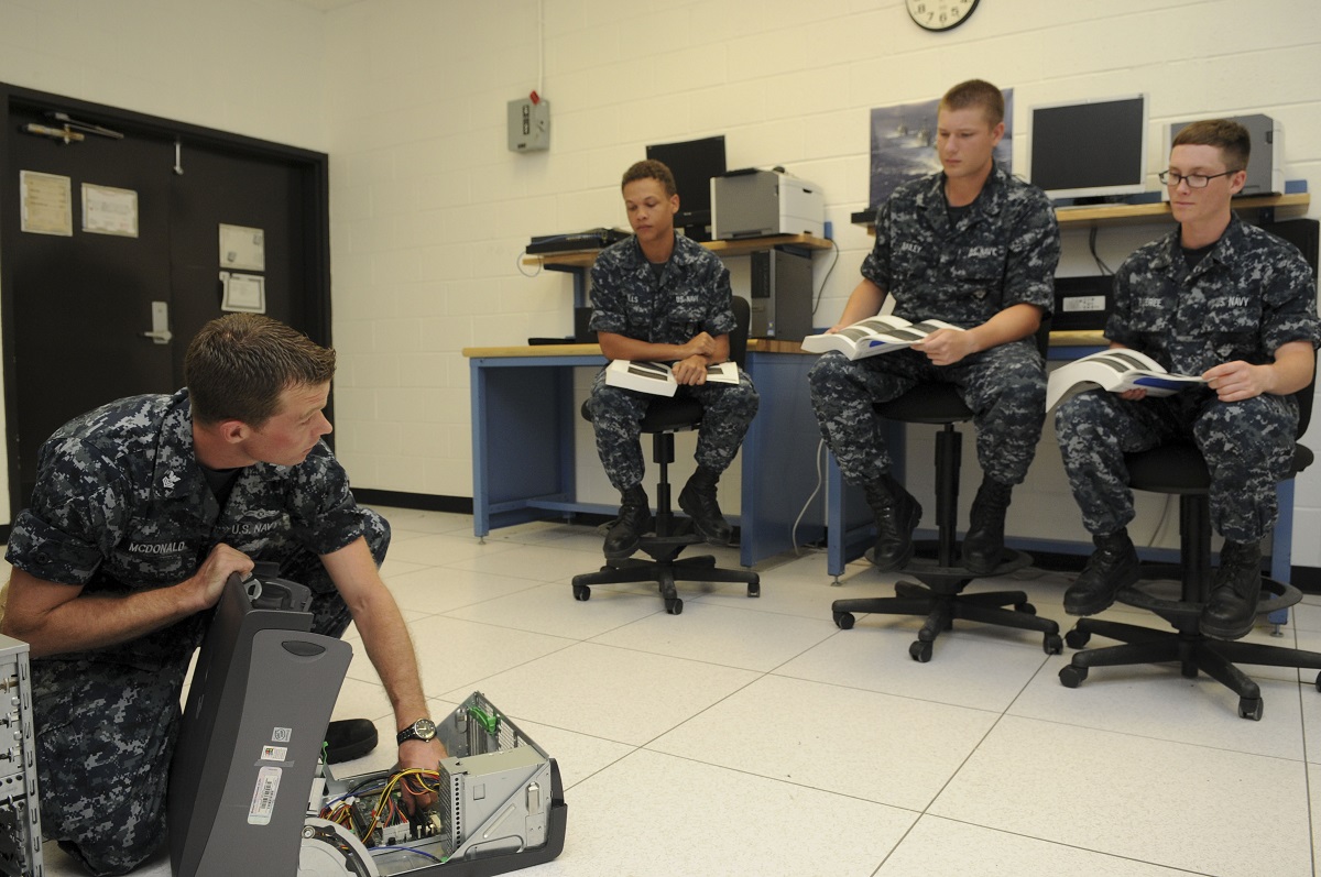 PENSACOLA, Fla. (July 26, 2016) Information Systems Technician 1st Class Justin McDonald teaches basic computer hardware configuration to students assigned to Information Warfare Training Command Corry Station aboard Naval Air Station Pensacola's Corry Station.  U.S. Navy photo by Mass Communication Specialist 3rd Class Taylor L. Jackson 