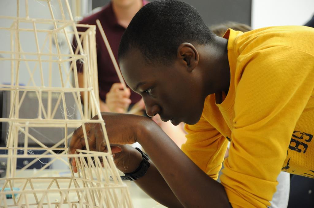 KING GEORGE. Va. – A middle school student builds a balsa wood tower he designed at the 2016 Naval Surface Warfare Center Dahlgren Division (NSWCDD)-sponsored Navy science, technology, engineering, and mathematics (STEM) Summer Academy, held June 27 to July 1. He was one of 96 middle school students who developed their teamwork and problem-solving skills in math and science while partnering with a teacher and an NSWCDD scientist or engineer.  U.S. Navy photo by Patrick Dunn.