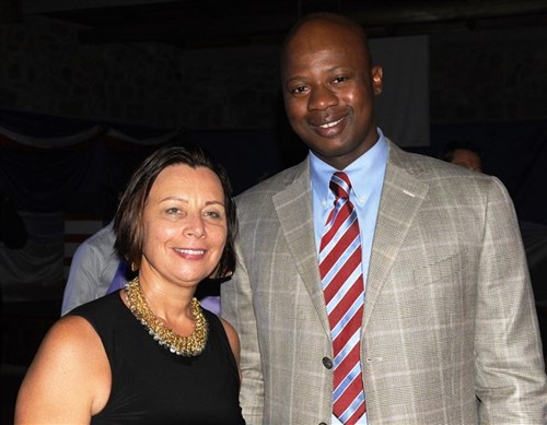 2nd Lt. Komi Afetse, Combined Joint Task Force-Horn of Africa, and Ambassador Dawn Liberi, U.S. Ambassador to the Republic of Burundi, pose for a photo during the 239th Marine Corps Birthday Celebration in Bujumbura, Burundi, Nov. 8, 2014. Afetse immigrated to the U.S. from Togo, and earned his commission through the Army Reserve Officer Accession Program on Feb. 14, 2015.  (U.S. Navy photo by Chief Mass Communication Specialist Allison Pittam/Released)