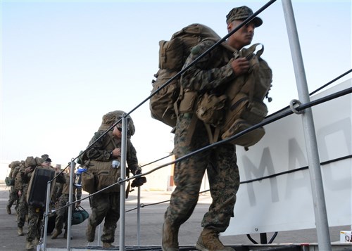 U.S. Marine Corps Africa Partnership Station Security Cooperation Task Force personnel embark the Royal Netherlands Navy (RNLN) landing platform dock HNLMS Rotterdam (L800). The ship and combined security cooperation task force, comprised of U.S., U.K., Spanish and Dutch Marines, will conduct practical application exercises in security techniques and tactics alongside partner forces from West African over the next three months in support of Africa Partnership Station. APS is an international security cooperation initiative, facilitated by Commander, U.S. Naval Forces Europe-Africa, aimed at strengthening global maritime partnerships through training and collaborative activities in order to improve maritime safety and security in Africa. (U.S. Navy photo by Mass Communication Specialist 2nd Class Travis S. Alston/Released)