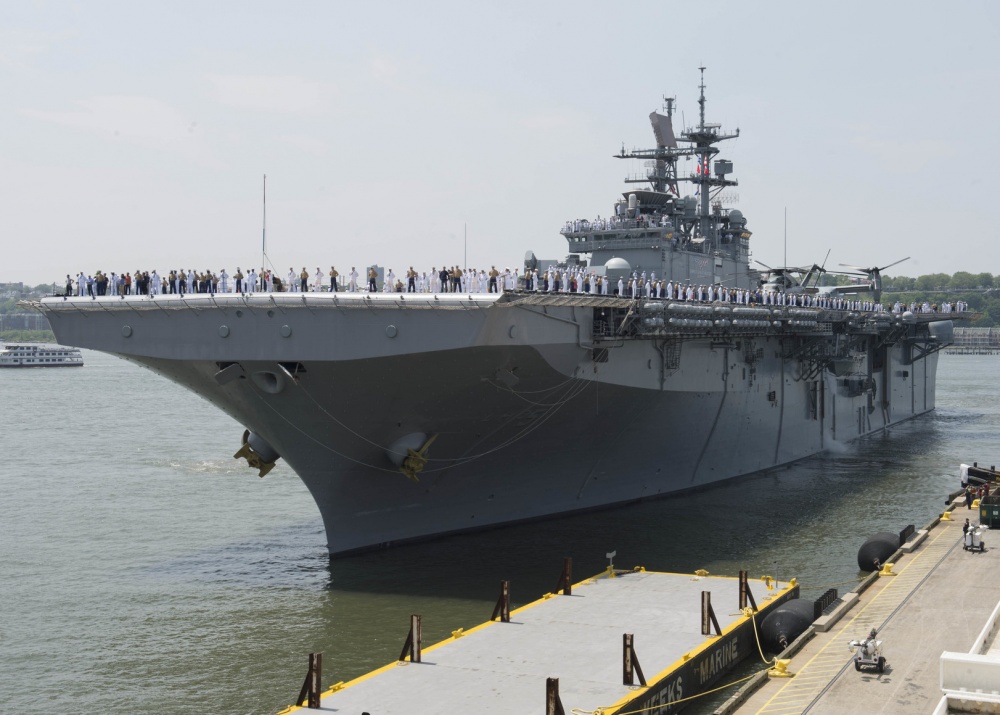 NEW YORK (May 25, 2016) - Sailors and Marines man the rails as USS Bataan (LHD 5) prepares to moor in New York for Fleet Week 2016 (FWNY). FWNY, now in its 28th year, is the city's time-honored celebration of the sea series. It is an unparalleled opportunity for the citizens of New York and the surrounding ti-state area to meet Sailors, Marines and Coast Guardsmen, as well as witness firsthand the latest capabilities of today's maritime series. The weeklong celebration has been held nearly every year since 1984. U.S. Navy photo by Mass Communication Specialist 1st Class Amanda Dunford.