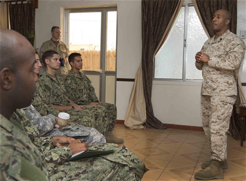 CAMP LEMONNIER, Djibouti (July 27, 2012) - U.S. Marine Corps Command Sgt. Maj. Gary Smith speaks with newly-assigned Combined Joint Task Force - Horn of Africa service members during a command indoctrination July 26. Smith assumed the CJTF-HOA senior enlisted leader position from U.S. Air Force Chief Master Sgt. James Davis. Smith is responsible for advising the CJTF-HOA commander on all issues affecting the health, morale, welfare and professional development of more than 1,800 Army, Navy, Air Force and Marine Corps members. (U.S. Air Force photo by Staff Sgt. Christopher Ruano)