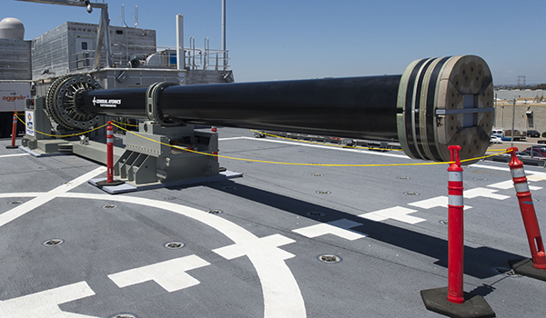 One of two electromagnetic railgun prototypes on display aboard joint high-speed vessel USS Millinocket in port at Naval Base San Diego. The railguns are being displayed as part of the Electromagnetic Launch Symposium, which brought together representatives from the U.S. and allied navies, industry and academia to discuss directed energy technologies. Navy photo by Petty Officer 2nd Class Kristopher Kirsop  