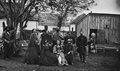 Pictured in 1864 are Civil War volunteer nurse Abby Gibbons of New York City, her daughter Sarah and officers in the main eastern theater of war, Grant's Wilderness Campaign. (Courtesy: Library of Congress)