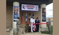 Army Lt. Col. Audra Taylor (center, left), director of the Army Blood Program, Navy Capt. Roland Fahie (center), director of the Armed Services Blood Program, and Air Force Lt. Col. Angela Hudson (center, right), director of the Air Force Blood Program, cut the ribbon at the new Armed Services Blood Bank Center-San Antonio, May 16.