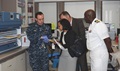 Dr. Karen Scott (center), chief medical officer for the Office of the Assistant Secretary for Health, Department of Health and Human Services, visits the Walter Reed National Military Medical Center to review the first U.S. Department of Defense pathogen reduction technology. 