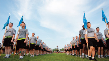 Soldiers stand in formation for physical training.