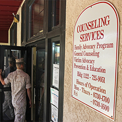 Service member going into counseling office.