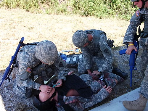 Soldiers practice during combat life saving course