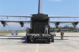 U.S. Air Force Staff Sgt. Dustin Jett, 612th Air Base Squadron senior information controller, helps aircrew members from Dyess Air Force Base, Texas load a “conex” box onto a C-130J Hercules at Soto Cano Air Base, Honduras, Oct. 7, 2016. U.S. Southern Command requested heavy airlift to transport critical equipment packages needed to sustain helicopter flight operations in Haiti being conducted by Special Purpose Marine Air-Ground Task Force-Southern Command and Joint Task Force-Bravo’s 1st Battalion, 228th Aviation Regiment using two CH-53E Super Stallions, three CH-47 Chinooks, and two UH-60L and two HH-60L Black Hawks in support of the U.S. Agency for International Development-led mission to alleviate human suffering and bolster Haitian disaster response capabilities.