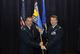 Col. Steven Dickerson, commander of the 557th Weather Wing, left, receives the guidon from Col. Steven Shannon, the outgoing commander of the 2nd Weather Group in the 557th WW Auditorium at Offutt Air Force Base, Neb., Aug. 1, 2016. Shannon passed command to Col. Jason Patla. (U.S. Air Force photo/Jeff Bridges)