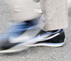 Shot of feet in motion, tennis shoes