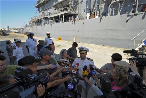 CONSTANTA, Romania (June 7, 2011) - Capt. James W. Kilby, commanding officer of the Ticonderoga-class guided-missile cruiser USS Monterey (CG 61), speaks to local Romanian media on the pier, during a port visit, as part of the European Phased Adaptive Approach. Monterey, homeported out of Norfolk, is on a six-month deployment in the U.S. 6th Fleet area of responsibility. (U.S. Navy photo by Mass Communication Specialist 2nd Class Daniel Viramontes/Released) 
