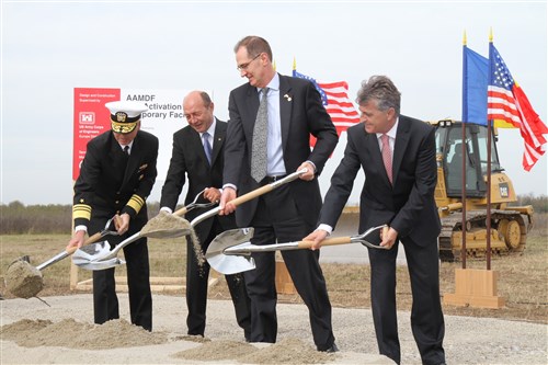 U.S. and Romanian officials break ground on the Aegis Ashore Missile Defense Complex during a formal ceremony Monday at Deveselu Air Base, Romania. Pictured, from left, are: Vice Adm. James Syring, the Missile Defense Agency director; Romanian President Traian B"sescu; U.S. Undersecretary of Defense for Policy James Miller; and Romanian Defense Minister Mircea Dusa.