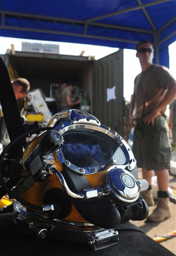 ODESSA, Ukraine ~~ Sailors of Underwater Construction Team (UCT) 1, from Joint Expeditionary Base Little Creek Fort Story, Va., prepare for one of many joint dive evolutions with Danish and Ukrainian navy divers on Ukrainian Western Naval Base during exercise Sea Breeze 2010 July 14. Sea Breeze is an annual maritime exercise in the Black Sea focusing on enhancing maritime security capabilities. Sea Breeze is the largest exercise this year in the Black Sea including 20 ships, 13 aircraft and more than 1,600 military members from Azerbaijan, Austria, Belgium, Denmark, Georgia, Germany, Greece, Moldova, Sweden, Turkey, Ukraine and United States. (U.S. Navy photo by Mass Communication Specialist 1st Class (SW) Gary Keen)