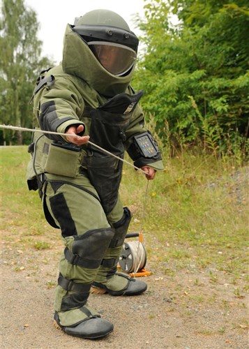 GRAFENWOEHR, GE – Spc. Earl H. Loria performs explosive ordnance disposal procedures by remotely opening a door. Loria is currently doing real world EOD missions, as part of the Overseas Deployment Training Program at the Joint Multinational Training Command, also known as JMTC, at Grafenwoehr, Germany. The JMTC is the U.S. Army’s only overseas training command.  