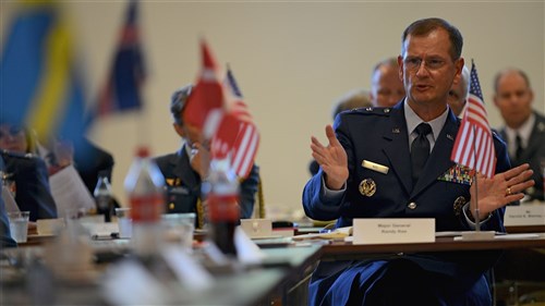 Maj. Gen. Randy Kee, U.S. EUCOM Director of Policy, Strategy, Partnering and 
Capabilities, discusses military-related topics with his counterparts at the Arctic Security Forces Roundtable.
