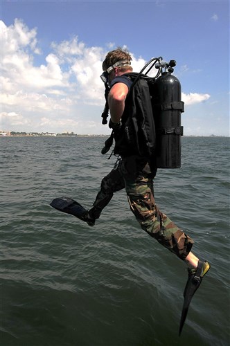 CONSTANTA, Romania (June 20, 2013) - Navy Diver 2nd Class Travis Wooden dives off the Romanian ship Saturn during Eurasia Partnership (EP) Dive 2013.  EP Dive, co-hosted by the Romanian and U.S. Navies, includes diving teams from Azerbaijan, Bulgaria, Georgia, Romania, Ukraine and the United States. EP Dive, aims to help increase diving interoperability, standardization of procedures and equipment familiarity. (U.S. Navy photo by Mass Communication Specialist 2nd Class Caitlin Feddersen/Released)