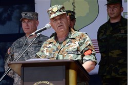 Republic of Macedonia Army Joint Operation Command Chief of Staff Brig. Gen. Racaj Muhamed, speaks to service members during the opening ceremony for exercise Shared Resilience May 28, 2013, at Pepelishte, Macedonia.Shared Resilience is an annual U.S. European Command-sponsored, Chairman of the Joint Chiefs of Staff-directed regional and multilateral exercise designed to provide medical training and operational experience between the United States and partner nations. 

Read more: http://www.dvidshub.net/image/943093/opening-day-ceremony-starts-off-shared-resilience-13-exercise#ixzz2XWLYTgQS