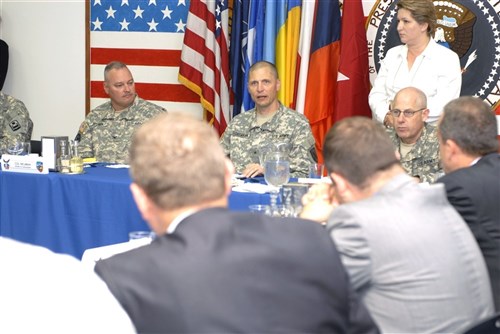 CAMP BONDSTEEL, Kosovo &mdash; Army Brig. Gen. Al Dohrmann, commander of Multinational Battle Group East, speaks to local mayors at a luncheon at Camp Bondsteel, Kosovo, July 9. Dohrmann was hoping to say goodbye to the Kosovo people and his replacement Army Col. Francisco J. Neumann greeted his new command. (U.S. Army photo by Pfc. Brian J. Holloran)