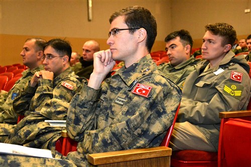 Turkish military attendees listen to one of several subject matter experts during Cyber Endeavor 2013, held from Sept. 17-20 in Grafenwoehr, Germany. The event featured speakers from government and industry sharing ideas on cyber security.