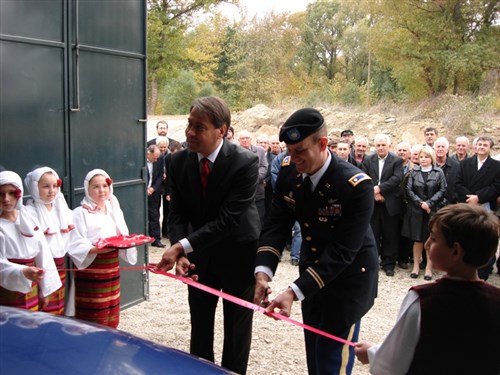 Cutting the ribbon on the Macedonia garage project.