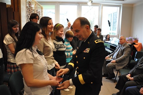 Maj. Gen. William L. Enyart, Adjutant General Illinois National Guard, meets students from the Krakow School for the Blind and Visually Impaired.