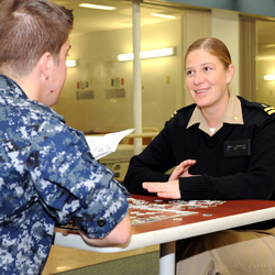 Image of a Navy Psychologist talking to a patient