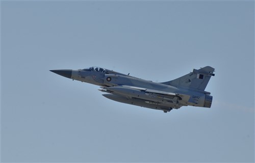 SOUDA BAY, Greece (Mar. 25, 2011) A Qatar Emiri Air Force Dassault Mirage 2000-5 fighter jet takes off as part of a Joint Task Force Odyssey Dawn mission. Joint Task Force Odyssey Dawn is the U.S. Africa Command task force established to provide operational and tactical command and control of U.S. military forces supporting the international response to the unrest in Libya and enforcement of United Nations Security Council Resolution (UNSCR) 1973. UNSCR 1973 authorizes all necessary measures to protect civilians in Libya under threat of attack by Qadhafi regime forces. JTF Odyssey Dawn is commanded by U.S. Navy Adm. Samuel J. Locklear, III. (U.S. Navy Photo by Paul Farley/Released)