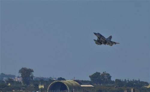 SOUDA BAY, Greece (Mar. 25, 2011) A Qatar Emiri Air Force Dassault Mirage 2000-5 fighter jet takes off as part of a Joint Task Force Odyssey Dawn mission. Joint Task Force Odyssey Dawn is the U.S. Africa Command task force established to provide operational and tactical command and control of U.S. military forces supporting the international response to the unrest in Libya and enforcement of United Nations Security Council Resolution (UNSCR) 1973. UNSCR 1973 authorizes all necessary measures to protect civilians in Libya under threat of attack by Qadhafi regime forces. JTF Odyssey Dawn is commanded by U.S. Navy Adm. Samuel J. Locklear, III. (U.S. Navy Photo by Paul Farley/Released)