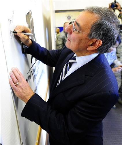 Secretary of Defense Leon Panetta signs a Wounded Warrior banner in the Contingency Aeromedical Staging Facility at Ramstein Air Base, Germany, Feb. 3, 2012. During his visit, the 23rd defense secretary expressed appreciation for the dedication and hard work of the service members who ensure wounded warriors receive world-class care.