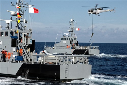 VALLETTA, Malta (Dec. 5, 2011) - The Armed Forces of Malta counterpiracy vessel protection detachment demonstrates aerial boarding procedures during Eurasia Partnership Capstone (EPC) 2011. Participants for EPC 2011 include approximately 100 representatives from Azerbaijan, Bulgaria, Georgia, Greece, Malta, Romania, Ukraine and the United States, who will focus on strengthening maritime relationships between Eurasian nations. Training workshops will range from maritime law enforcement, maritime search and rescue, marine environmental protection, leadership development courses for noncommissioned officers and, for the first time during EPC, advanced network-enabled maritime interdiction operations (MIO). 