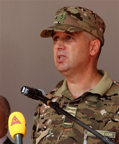 Montenegrin Army Maj. Ilija Dakovic addresses troops from 10 different countries during opening ceremonies for MEDCEUR 2010, Sept. 10, on Danilovgrad Army Base, Montenegro. This exercise will provide training to these service members to strengthen emergency response and efficient medical treatment in the event of any real-world disasters or accidents. For more information, visit www.usafe.af.mil/medceur.asp and www.odbrana.gov.me. (U.S. Marine Corps photo/Lance Cpl. Jad Sleiman)
