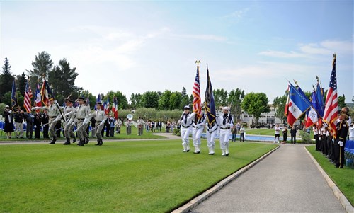 DRAGUIGNAN, France (May 27, 2012) – French army soldiers (left) and U.S. Navy Sailors (right) assigned to Commander, U.S. Naval Forces Europe-Africa, parade their countries colors during the Memorial Day ceremony at the Rhone American Cemetery and Memorial in Draguignan. Guests, including American and Allied service members, attended the ceremony in honor of the fallen heroes who gave their lives during the liberation of southern France in 1944. 