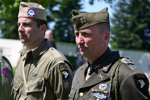 Several French history enthusiasts donned uniforms from both World War I and World War II. American Soldiers served in the Somme sector of the frontlines in France during World War I, alongside British, Canadian, Australian, Belgian and French forces. The Somme American Military Cemetery, near Bony, France, is the final resting place for more than 1,800 U.S. Soldiers. On May 27, 2012, troops from U.S. European Command, to include keynote speak Rear Admiral John Messerschmidt, U.S. Army Soldiers from the 5th Signal Theater Strategic Command and the Shape International Band, took part in a Memorial Day ceremony.