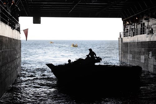 150612-N-ZZ999-0616    U.S. Marines load an amphibious assault vehicle aboard USS San Antonio LPD-17 June 12, during Baltic Operations 2015 (BALTOPS).  BALTOPS is an annual multinational exercise designed to enhance flexibility and interoperability, as well as demonstrate resolve among allied and partnered forces to defend the Baltic region. (Photo by Petty Officer 1st Class Adam C. Stapleton)