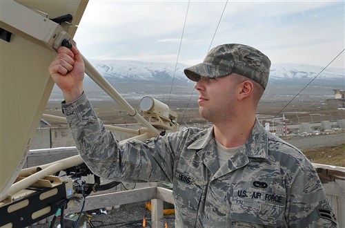 KRTSANISI NATIONAL TRAINING CENTER, Republic of Georgia &mdash; U.S. Air Force Airman 1st Class Evan Hess, transmission system technician, 1st Combat Communications Squadron, performs an operations check on a ground multi-band terminal used for long range communications here, Feb.9, 2010. Hess is deployed to the Republic of Georgia to provide tactical communication support to the Marine Corps Training and Advisory Group as they teach combat skills to Georgian soldiers preparing to deploy to Afghanistan. (U.S. Air Force photo by Senior Airman Tony R. Ritter)
