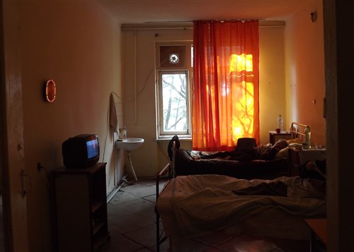 Two patients lay in a hospital room in the contagious wing of Kutaisi Tuberculosis Center in Kutaisi, Georgia, Jan. 27, 2014. A typical stay in a hospital like this lasts six months depending on the severity of the type of TB the patient has and how long it takes them to become noninfectious. 