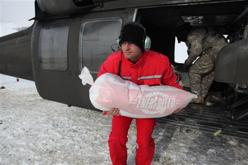 Soldiers from U.S. Army Europe's 12th Combat Aviation Brigade conduct a resupply mission with the Montenegrin Red Cross to deliver medical supplies to Montenegrins stranded by severe weather in Northern Montenegro Feb. 22. The soldiers are here as part of a U.S. task force to provide humanitarian assistance at request of the government of Montenegro coordinating with the National Emergency Operations Center and the Montenegrin Ministry of Defense to provide relief and to save lives, homes and infrastructure in response to heavy snowfall.