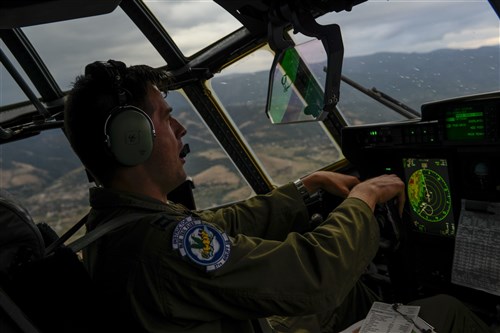 Capt. Derek Patrick, 37th Airlift Squadron pilot, flies over Plovdiv, Bulgaria during a formation flight during Exercise Thracian Summer 2016 July 17, Plovdiv, Bulgaria. Through Exercise Thracian Summer, the U.S. and Bulgaria will enhance their mutual ability to work together, with other NATO nations, and with key partners on regional security (U.S. Air Force photo/Senior Airman Nicole Keim)