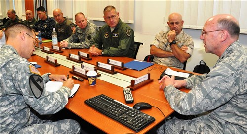 AFRICOM hosts faculty from the U.S. Air War College: U.S. AFRICOM Chief of Staff, U.S. Air Force Maj. Gen. Michael Kingsley (far right), welcomes faculty from the U.S. Air War College, Sept. 29, 2015.  The 16 faculty members were briefed by select AFRICOM staff about the commands mission and programs. (USAFRICOM photo by Brenda Law/Released)