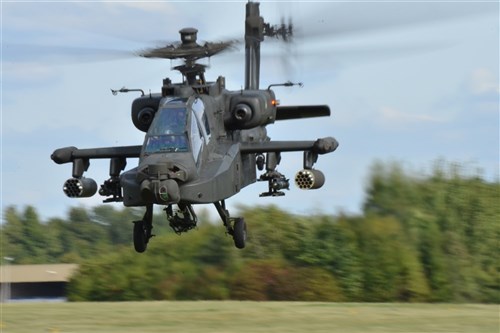 An Apache helicopter flown by a Dutch pilot departs Schweinfurt's Conn Airfield in Germany, Sept. 20, 2012, en route to Schwarzenborn, Germany as part of a raid exercise. About 1,200 Dutch, German and Danish troops set up camp on Conn Barracks earlier this month to participate in Peregrine Sword, a NATO exercise that will test the combat readiness of the 11th Air Maneuver Brigade within the Dutch armed forces.