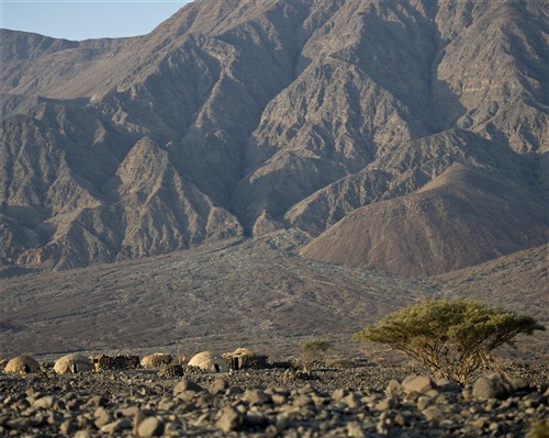 KARABTI SAN, Djibouti- The village of Karabti San sits at the base of the Djiboutian Mountains Nov. 2, 2012 Karabti San, Djibouti. It is the site where U.S. service members assigned to Combined Joint Task Force-Horn of Africa worked with local villagers to build a 21-foot-tall structure, which will serve as the village's community building. After three years of working on the project alongside CJTF-HOA service members, Karabti San residents have acquired the skills to build an Eco Dome on their own.   (U.S. Air Force photo by Tech. Sergeant Joseph McKee)