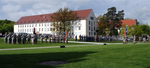 STUTTGART, Germany - Service members and civilians with the U.S. European Command conduct a dress rehearsal in preparation for a change of command ceremony on Patch Barracks May 10. Gen. Philip M. Breedlove will assume command of EUCOM, and NATO, from out going commander Adm. James Stavridis.