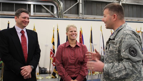 Army Lieutenant Colonel Dylan Carlson thanks IKD-M team members Tracy Colley (center) and Ralph Belander, fundraiser organizers, for making this fundraiser a huge success.   (Photo by Melony Angelilli)