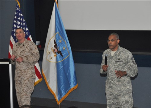 STUTTGART, Germany - U.S. Marine Corps Sergeant Major Bryan B. Battaglia, senior enlisted advisor to the Chairman of the Joint Chiefs of Staff (SEAC), and Chief Master Sergeant Jack Johnson Jr., U.S. Africa Command's senior enlisted leader, filter questions from the audience during an all-hands enlisted call on Patch Barracks, April 20, 2012.  This was the SEACC's first visit to U.S. AFRICOM since becoming the Defense Department's top senior non-commissioned officer and senior enlisted advisor. (U.S. AFRICOM photo by Staff Sergeant Olufemi A. Owolabi)