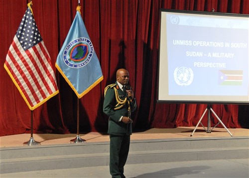 STUTTGART, Germany - Major General Moses Bisong Obi, force commander of the U.N. Mission in the Republic of South Sudan (UNMISS), addresses staff members at U.S. Africa Command in Stuttgart, Germany, December 13, 2011. Obi was invited to give a presentation on Waging Peace in Independent South Sudan; as part of U.S. AFRICOM's Commander's Speaker Series, which invites speakers with diverse viewpoints to the command to share ideas and thoughts. (U.S. AFRICOM photo by Danielle Skinner)